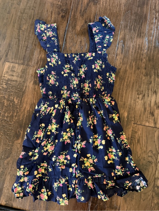 Anthropologie Dresses & Skirts - Navy Floral Ruffled Sundress with Smocked Bodice